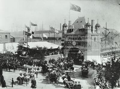 Blackwall Tunnel: horse-drawn carriages pass through the entrance ceremonial opening of the tunnel.